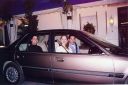 Joe_and_Kellee_Wedding_Car_with_Aaron.jpg